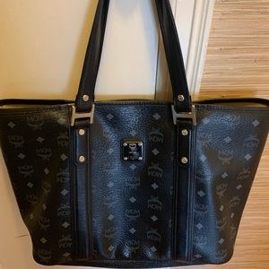 Medium size authentic MCM bag with wallet
